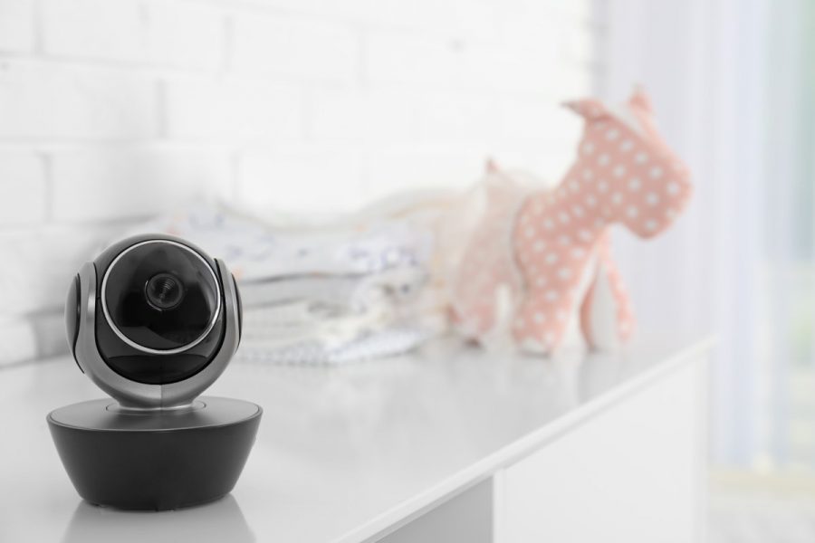 a surveillance camera on a piece of furniture